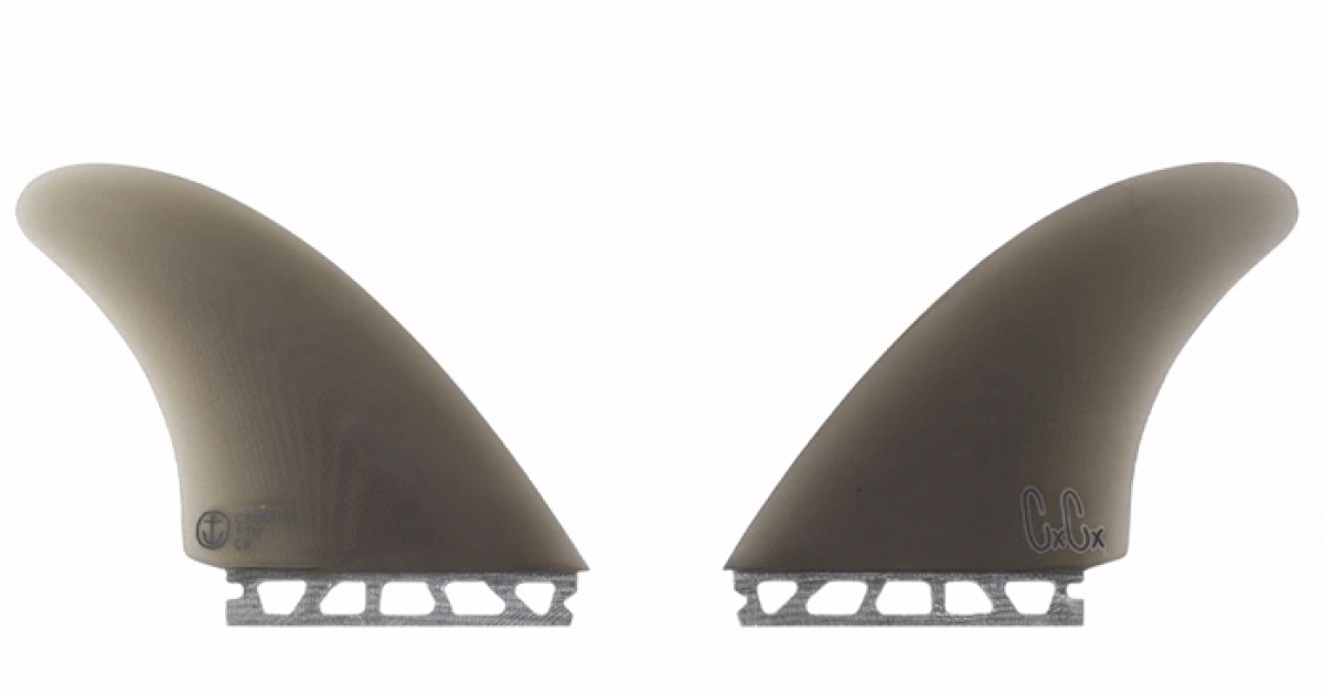 Twin tab fins outlet